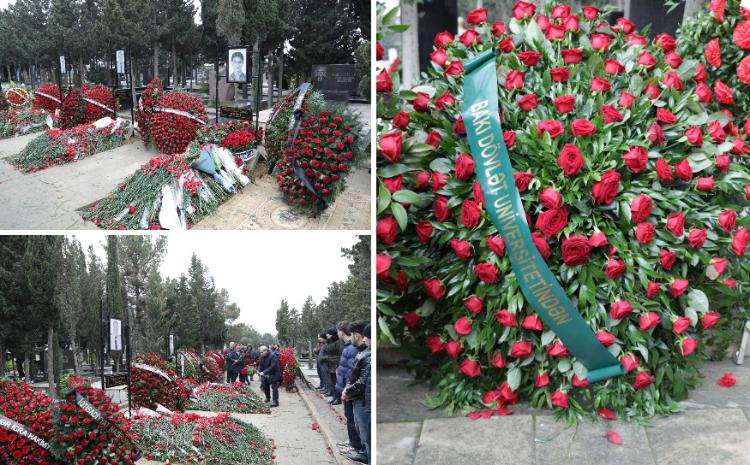 BDU əməkdaşları təyyarə qəzasında həlak olan ekipaj üzvlərinin məzarları önündə 